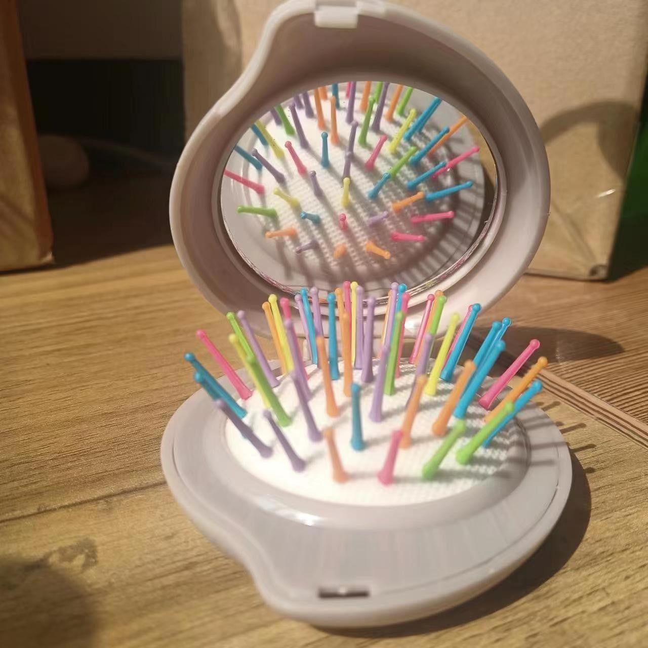 Wholesale ABS Droplet Shaped Cream Gel Folding Mirror Airbag Comb