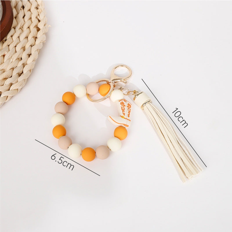 Wholesale 10pcs Halloween Cowboy Boots Silicone Tassel Wrist Keychain