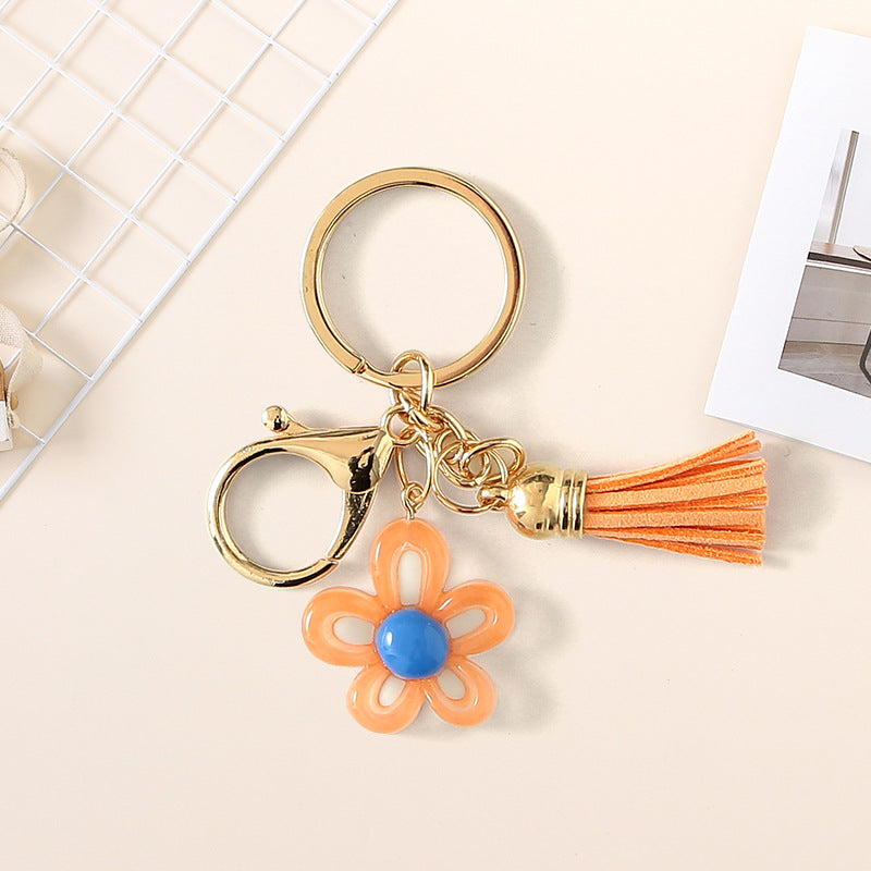 Wholesale Cute hollow sunflower tassel keychain