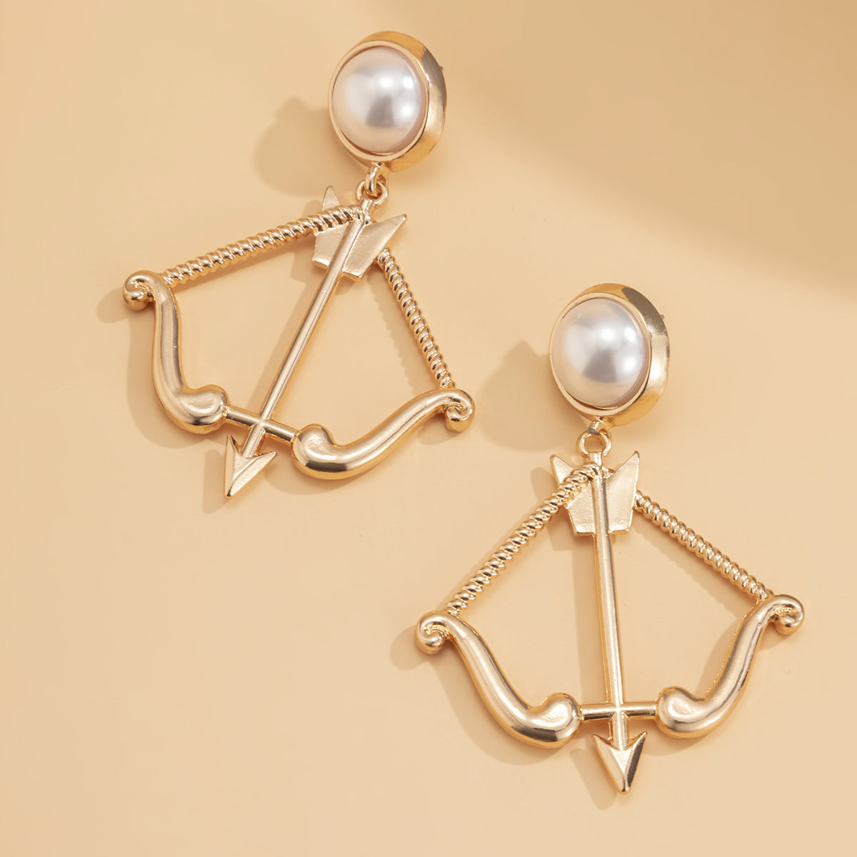 Wholesale Alloy Imitation Pearl Bow and Arrow Geometric Earrings