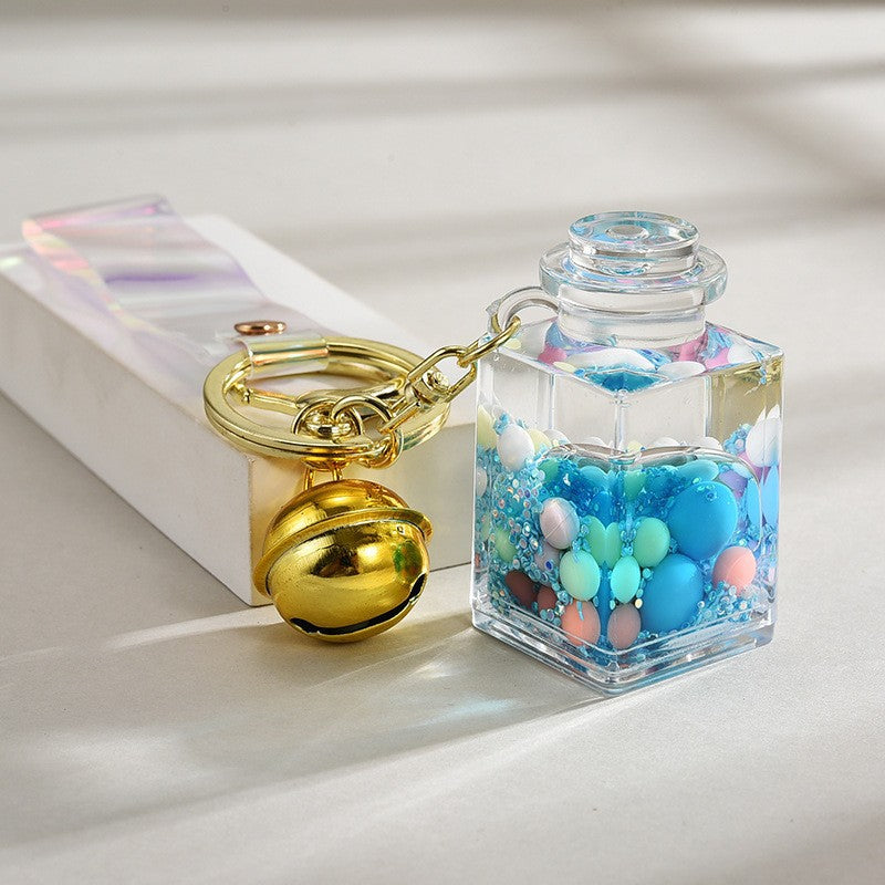 Wholesale Liquid sand bottle with colorful beads in oil bottle pendant acrylic keychain