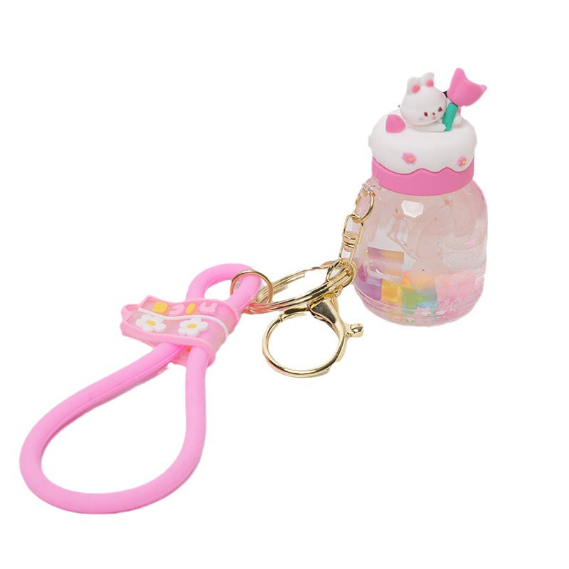 Botella flotante de dibujos animados acrílicos al por mayor en aceite Liquid Liquid Rabbit Keychain
