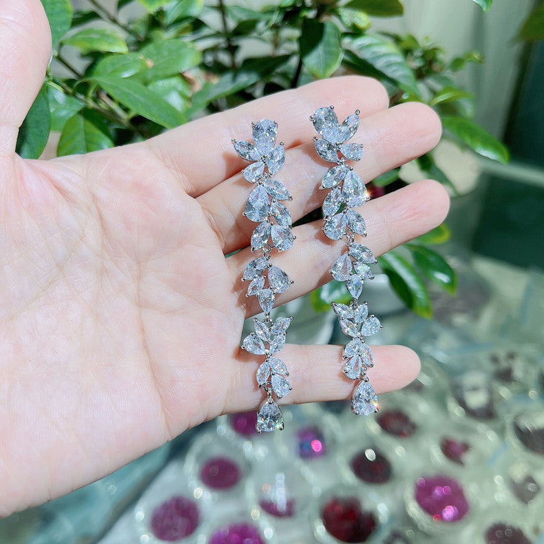 Wholesale Copper inlaid zircon intricate leaf earrings