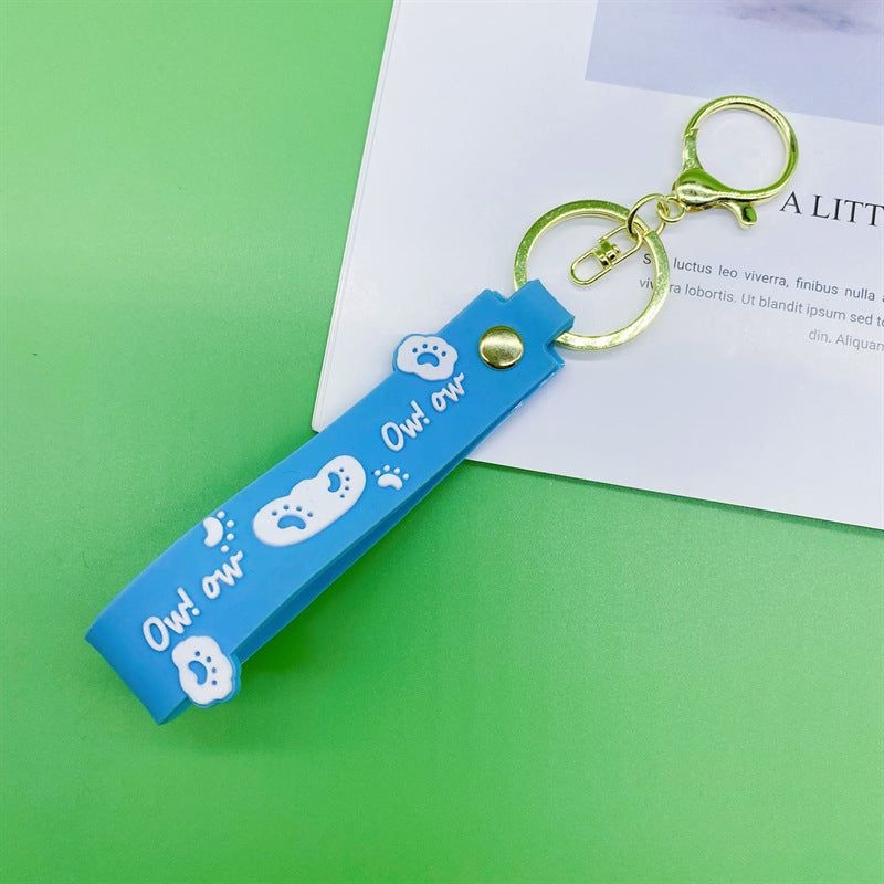 Al por mayor 10pcs PVC Dog Claw Cat Claw Keychain Rope de cuero