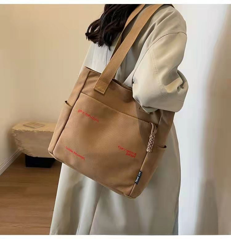 Wholesale Canvas bag shoulder bag large capacity commuter bag handbag bag
