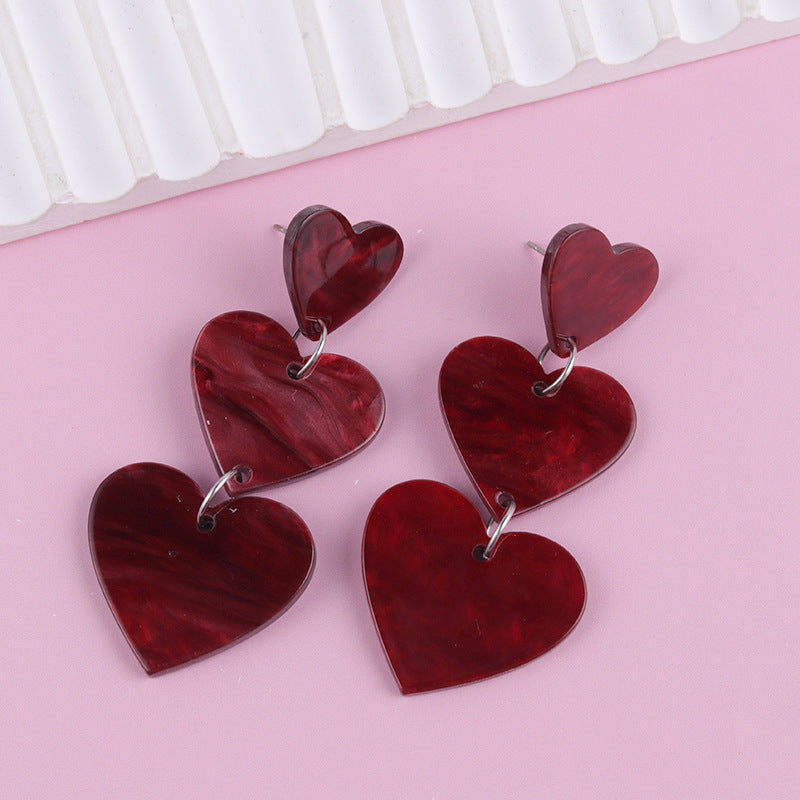 Wholesale Asymmetric long triple heart Acrylic Earrings