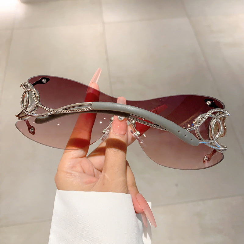 Wholesale Frameless one-piece snake temple sunglasses
