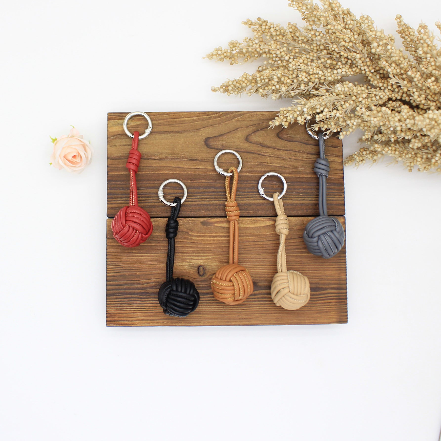 Wholesale Autumn and winter PU leather rope hand-woven ball bag pendant mobile phone pendant ins