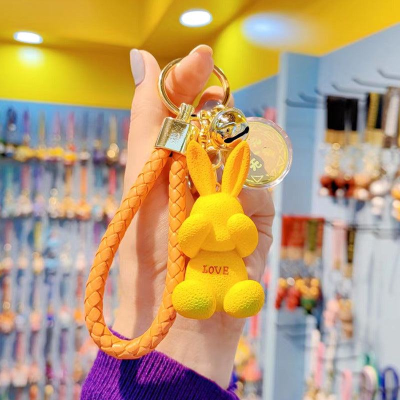 Caricatura de dibujos animados de dibujos animados de caricatura con llaves de conejo