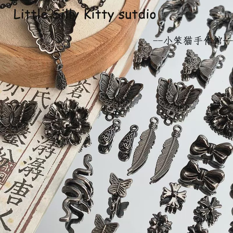 Wholesale Gun Black Peony Butterfly Snake Feather Moon Red Agate Alloy Charms DIY Bracelet Making Fashion Accessory Gift