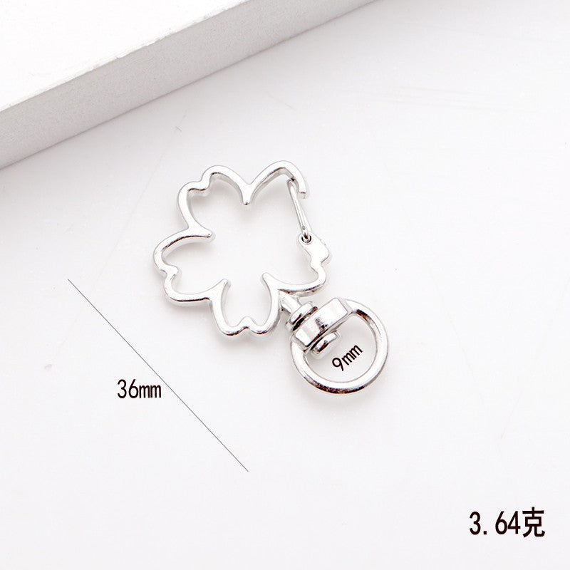 Wholesale shaped keychain metal cat dolphin love five-pointed star cherry blossom shell jewelry accessories diy