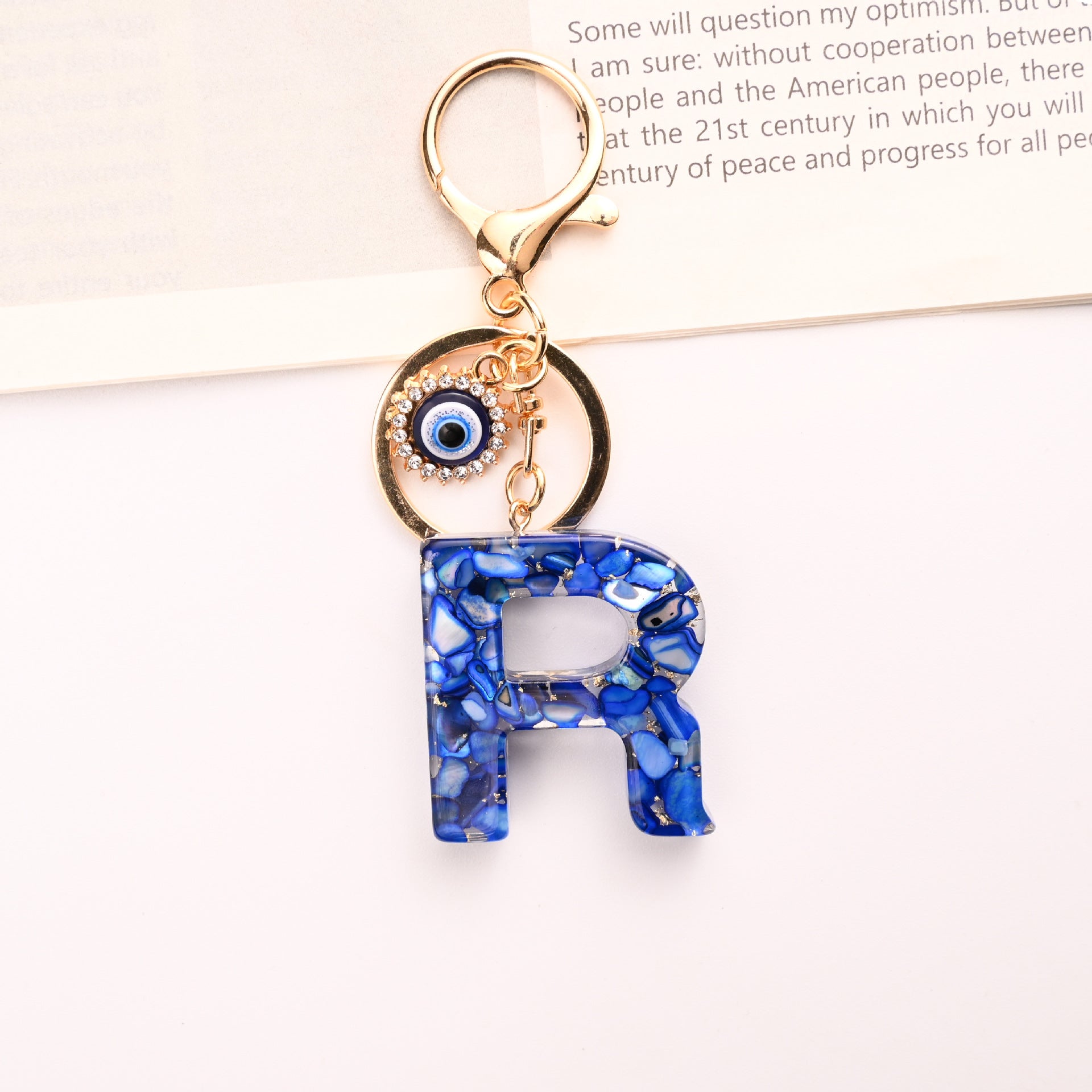 Wholesale Treasure Blue 26 English Letter Devil' s Eye Keychain