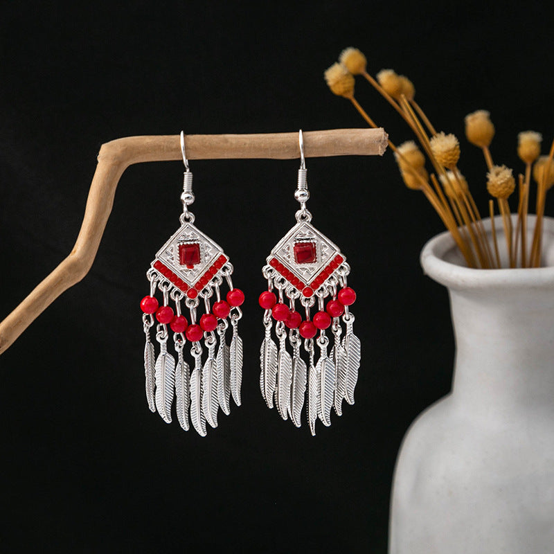 Wholesale Ethnic Style Long Style Feather Tassel Alloy Earrings