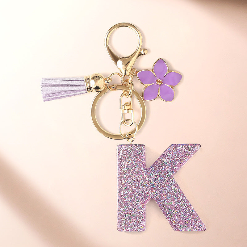 Wholesale Sparkling Pink 26 English Letter Purple Flower Keychain
