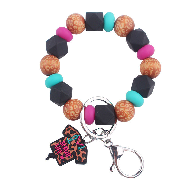 Wholesale Cartoon Nurse Uniform Silicone Beaded Wrist Keychain