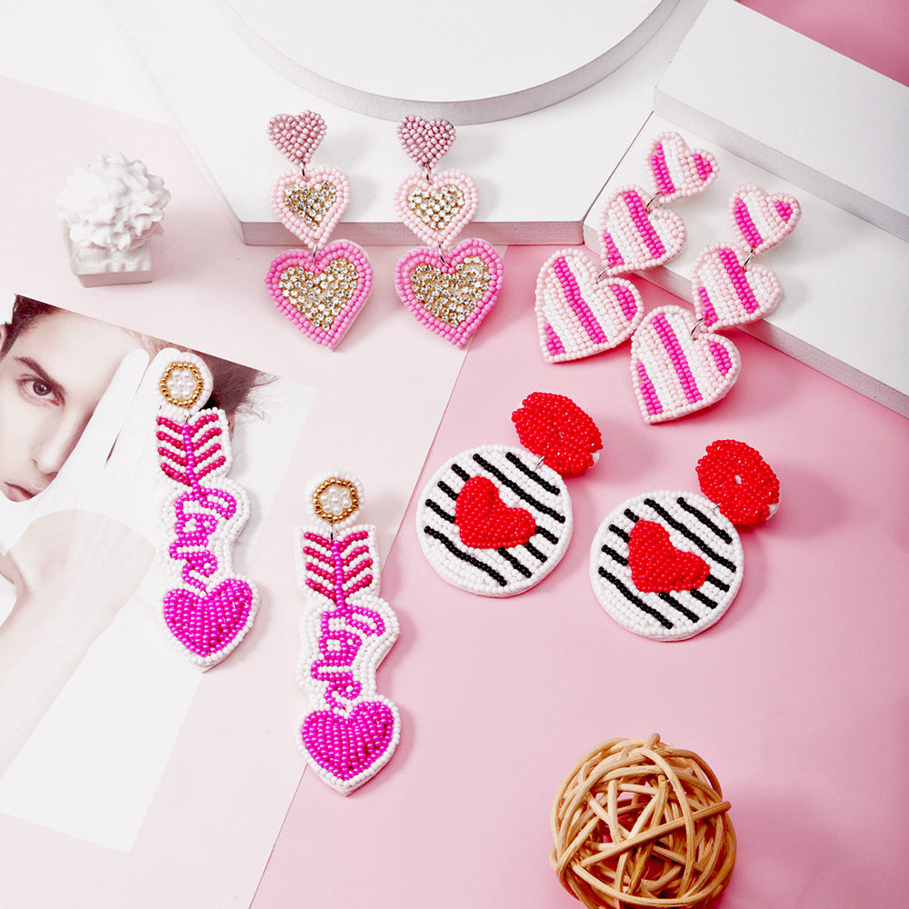 Wholesale Valentine's Day Pink Rice Pearl Knitted Love LOVE Earrings