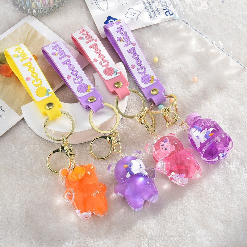 Wholesale Acrylic liquid sand bottle floating in oil keychain