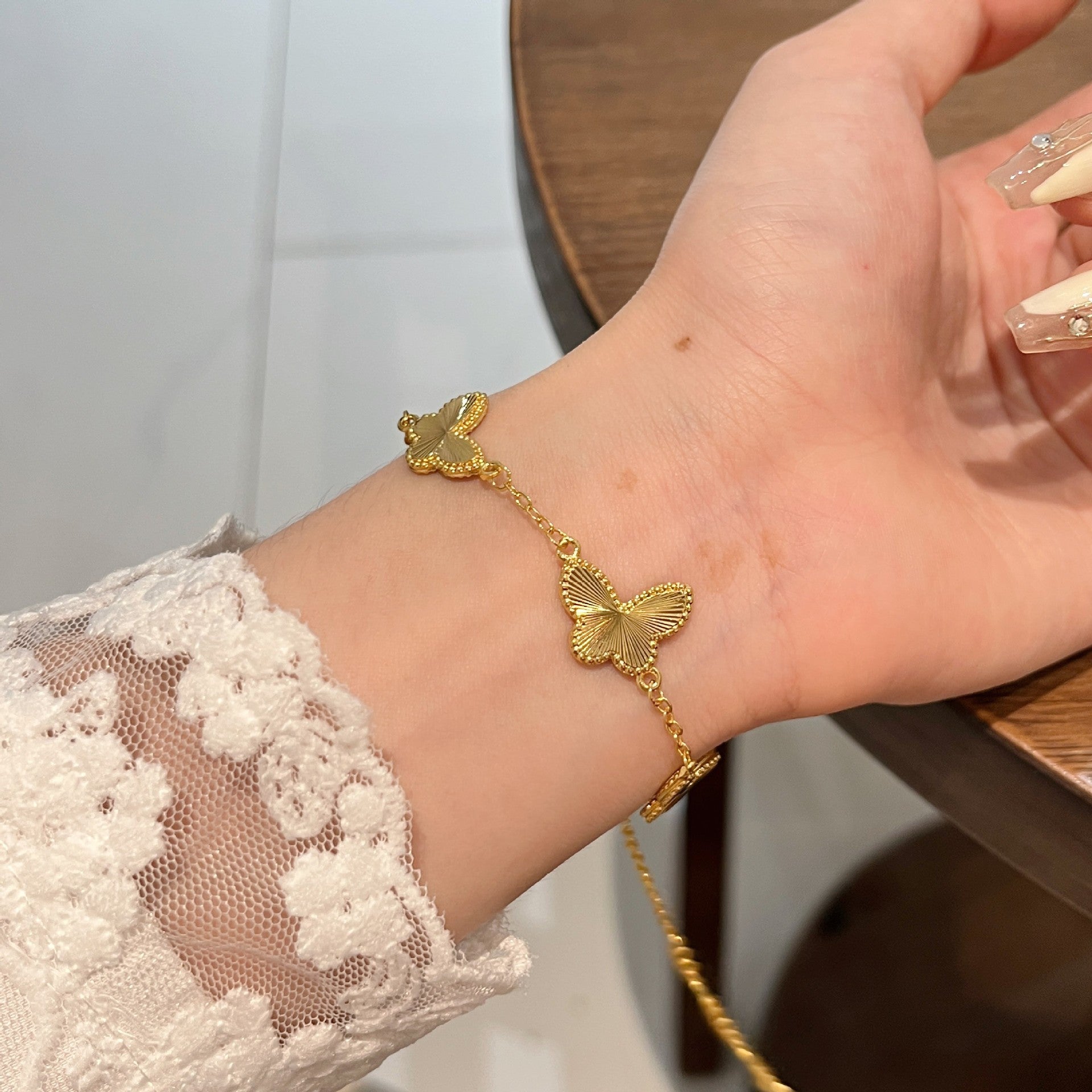 Wholesale Sense Golden Double-sided Butterfly Bracelet