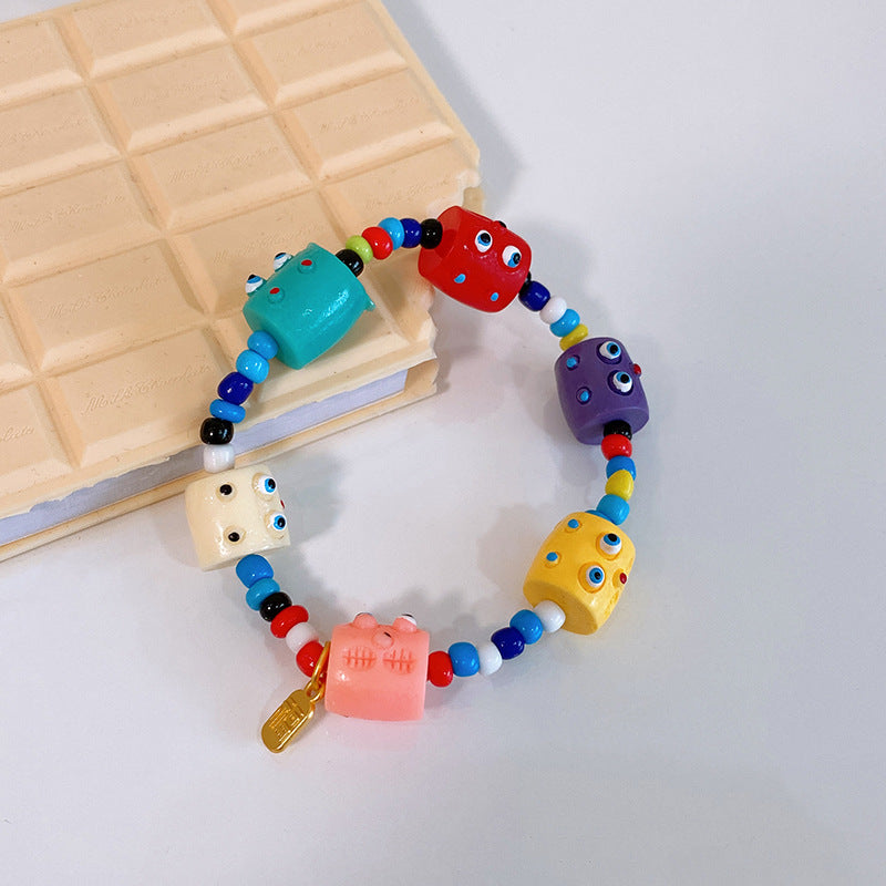 Wholesale Imitation Pearl Funny Little Monster Bracelet