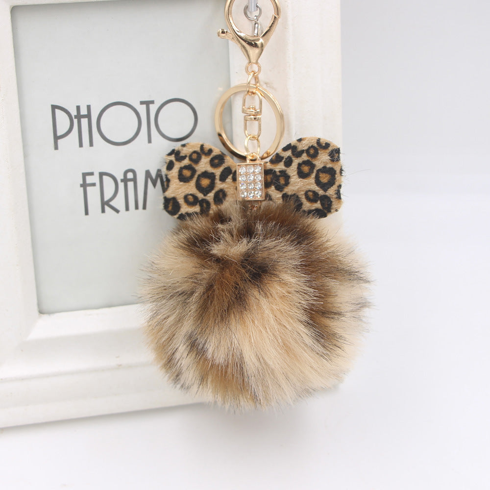 Wholesale Leopard Print Bow Pom Pom Bag Charm Keychain Artificial Leather Fashion Decorative Accessory Women S Car Key Pendant Boutique Gift Resale