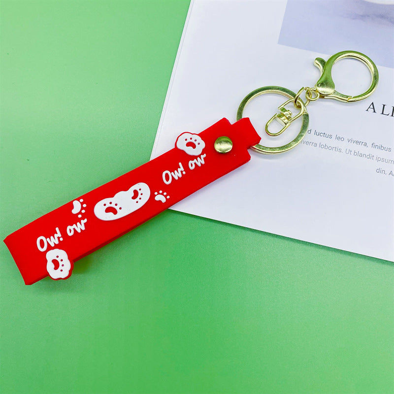 Al por mayor 10pcs PVC Dog Claw Cat Claw Keychain Rope de cuero