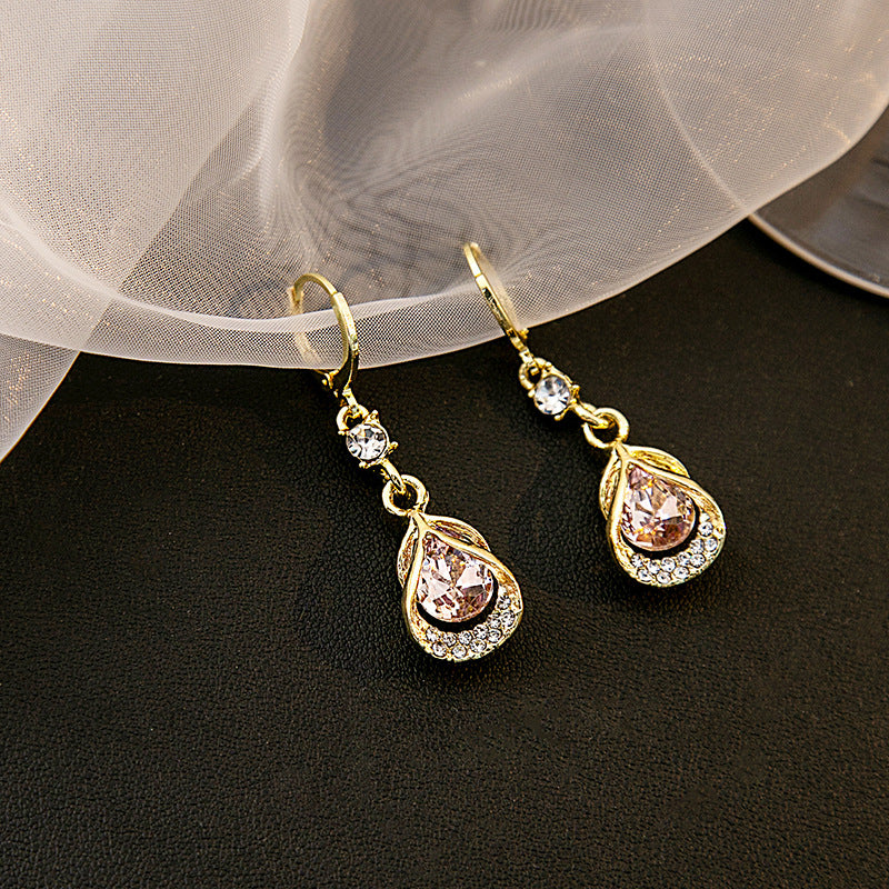 Wholesale Cat's Eye Stone Diamond Droplet Hollow Alloy Earrings