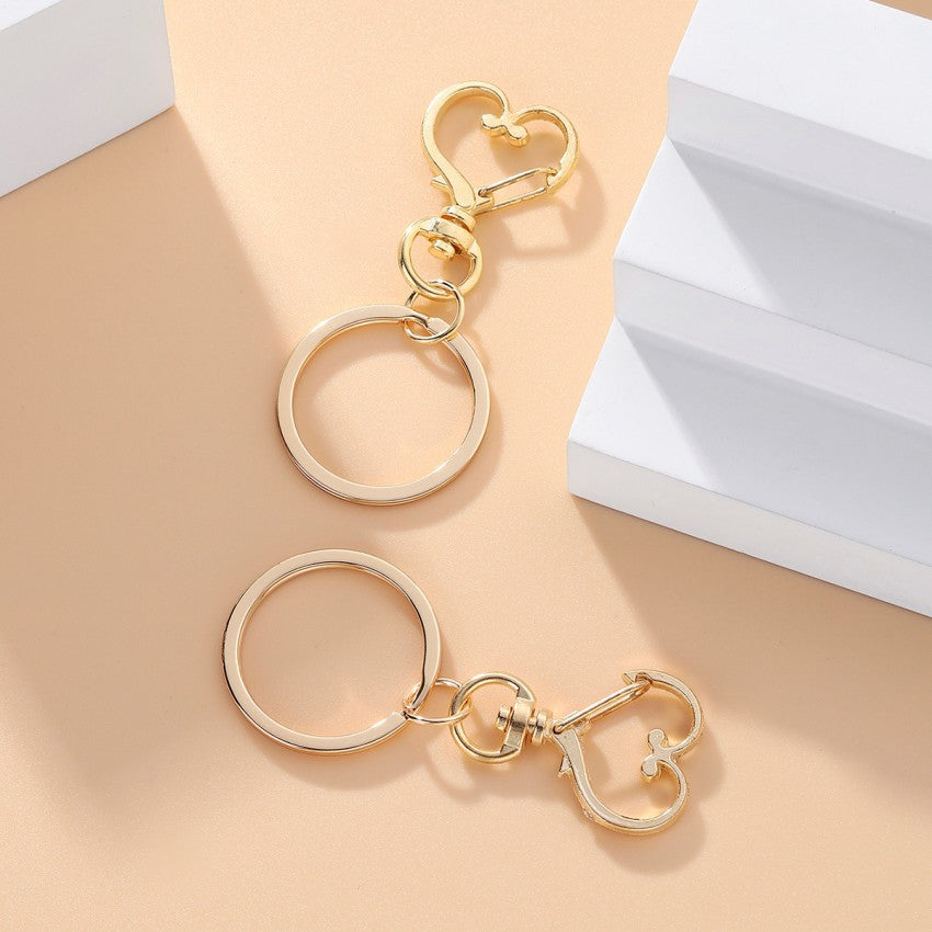 Accesorios al por mayor de llavero de metal de oro del corazón