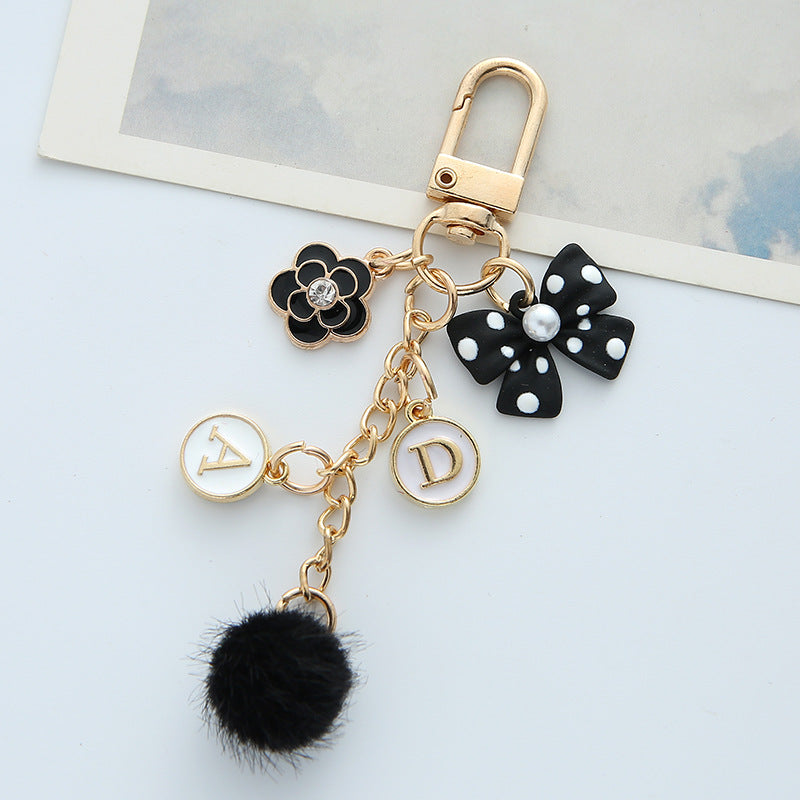 Wholesale Bowknot Pearl Alphabet Heart Hair Ball Alloy Keychains