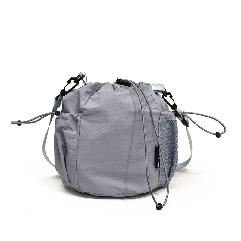 Wholesale Japanese style drawstring bucket versatile nylon messenger bag