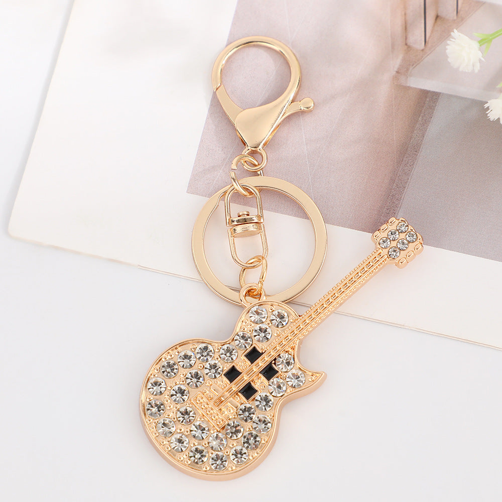 Wholesale Retro guitar with rhinestone metal keychain