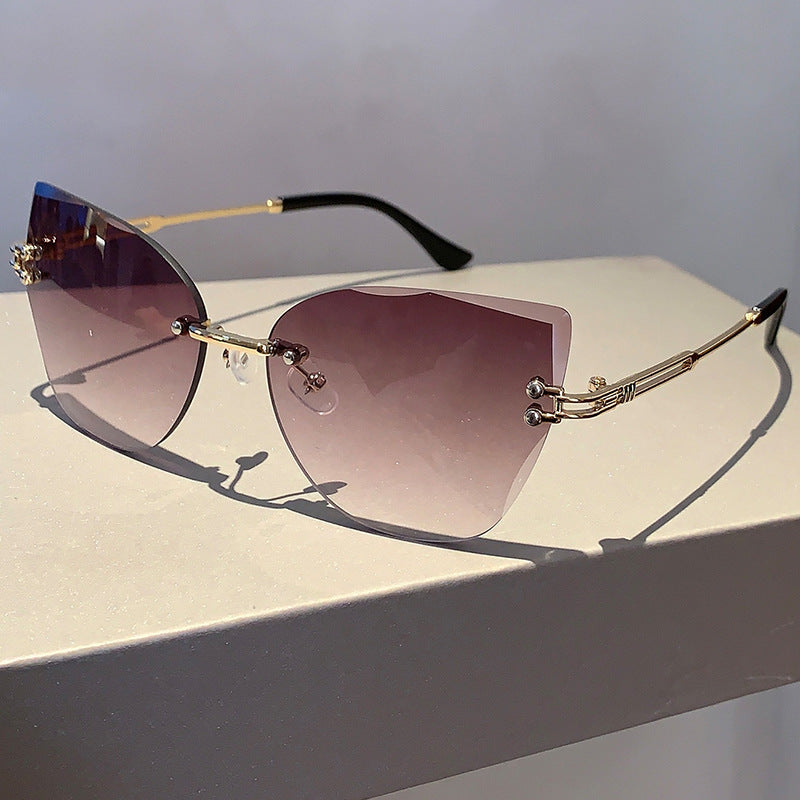 Wholesale Retro frameless cut-edge sunglasses cat-eye gradient sunglasses