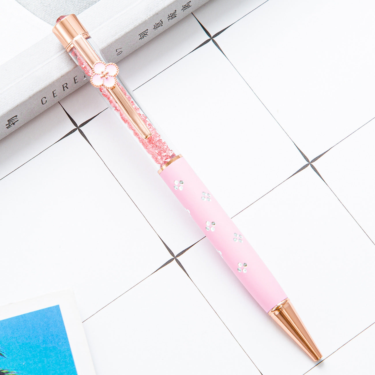 Bolígrafo de cristal de trébol de metal al por mayor