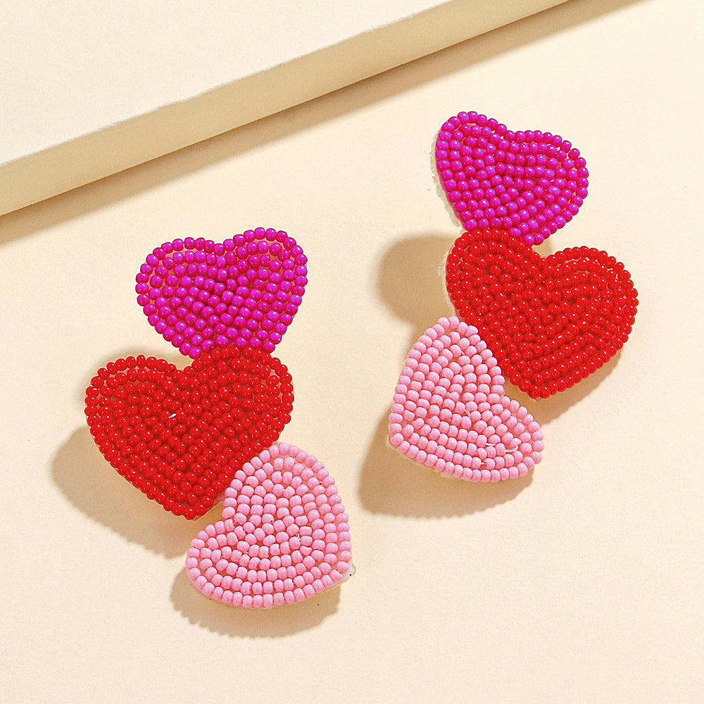 Wholesale  fashion temperament handmade three heart rice beads irregular earrings earrings Valentine's Day