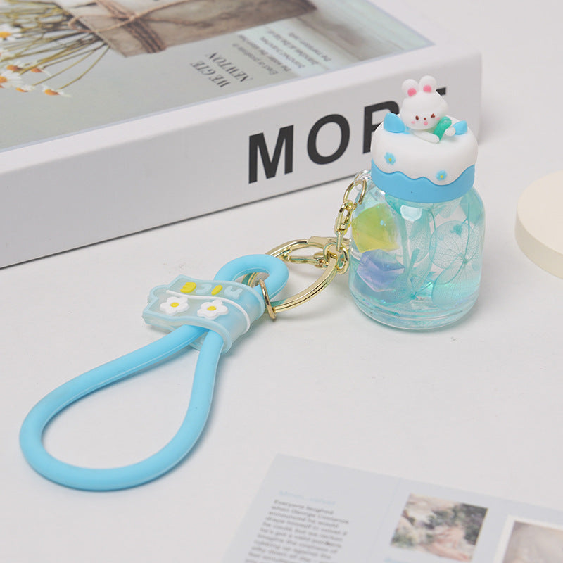 Botella flotante de dibujos animados acrílicos al por mayor en aceite Liquid Liquid Rabbit Keychain