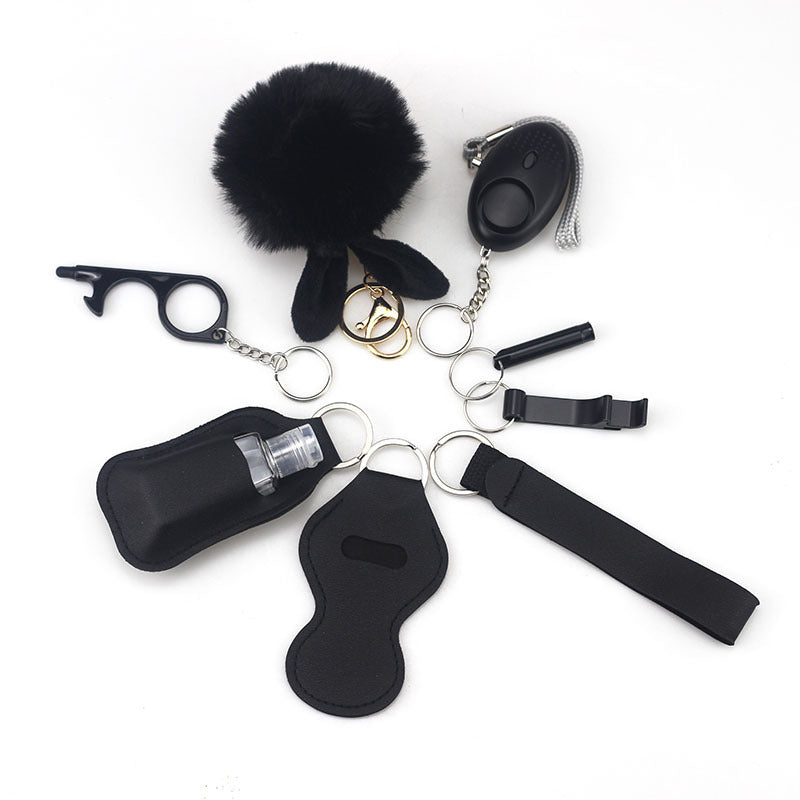 Wholesale Outdoor Whistle Hand Sanitizer Leather Case Fur Ball Key Chain Set