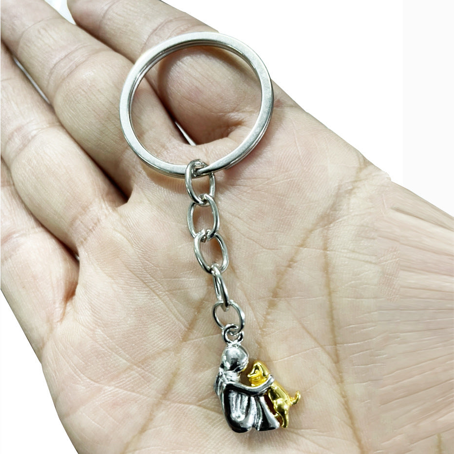Wholesale Cute girl and dog embracing earrings