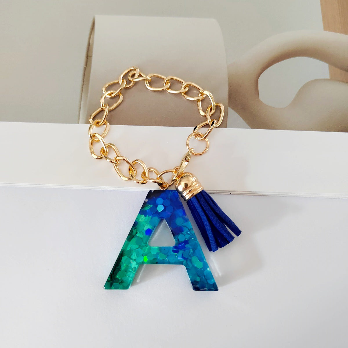 Wholesale Mixed color blue English letter keychain