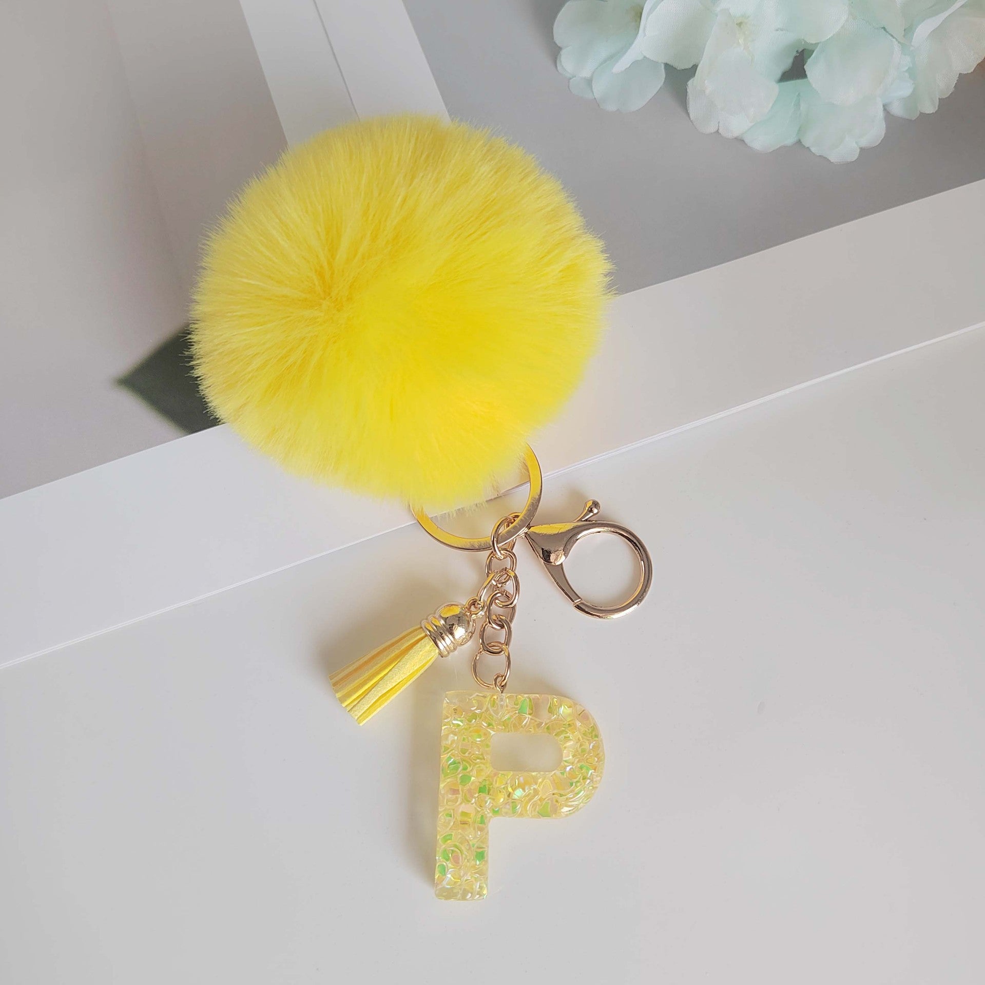 Wholesale Yellow letter ball pendant flower shaped letter keychain