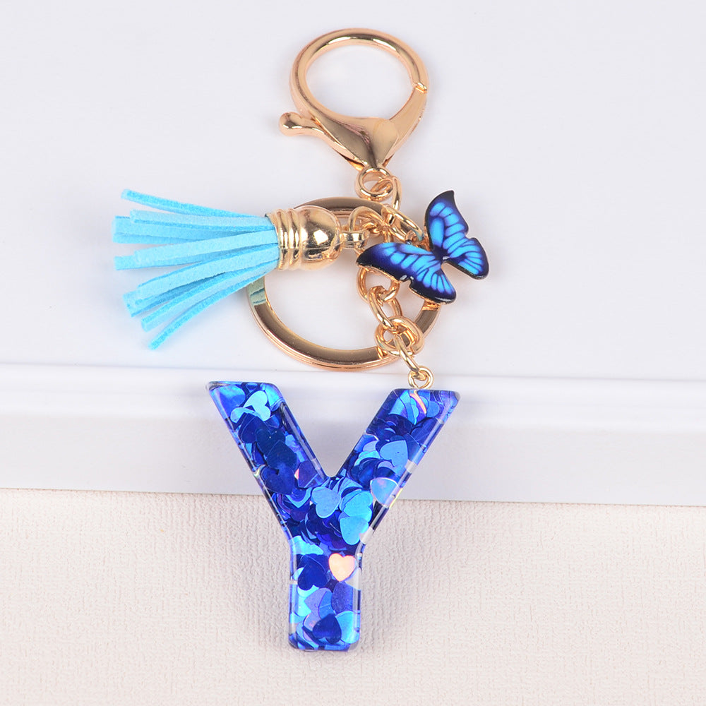 卸売ブルーラブバタフライタッセルレター樹脂キーホルダー