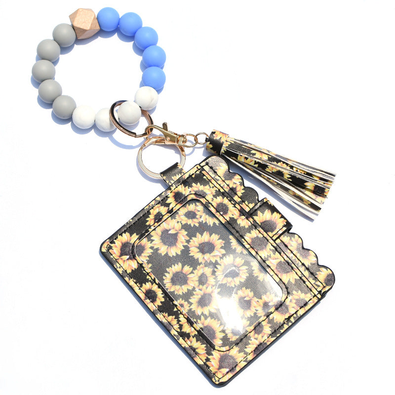 Wholesale Silicone Bead Bracelet Card Holder Tassel Wallet Keychain