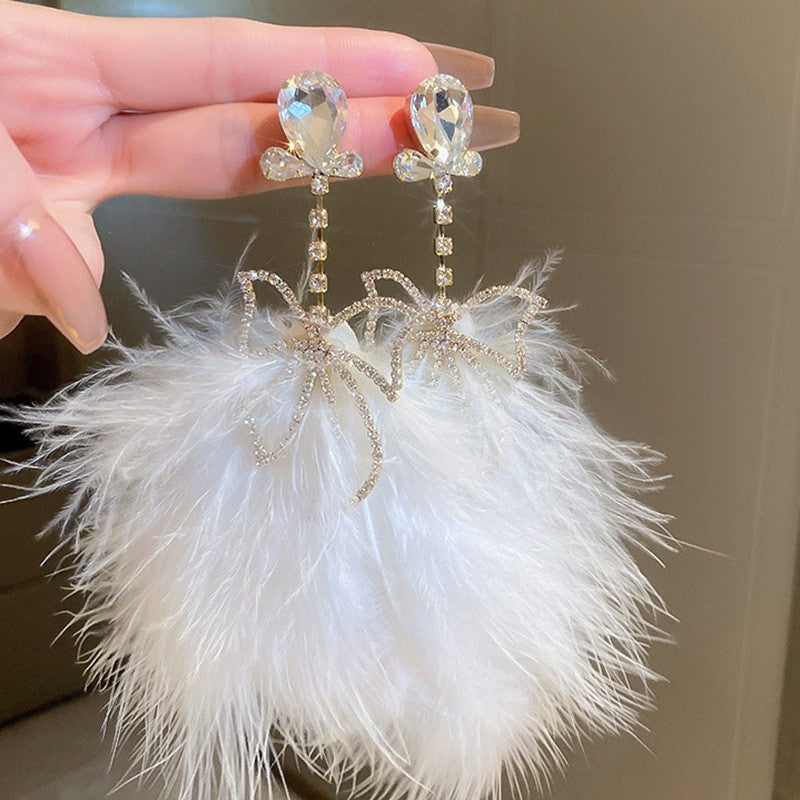 Wholesale Diamond studded bow feather tassel earrings