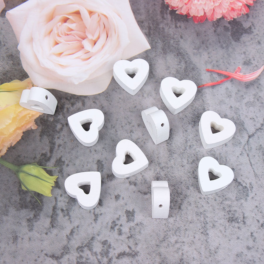 Wholesale  20PCS Valentine's Day Heart-shaped Hollow Perforated Wooden Beads