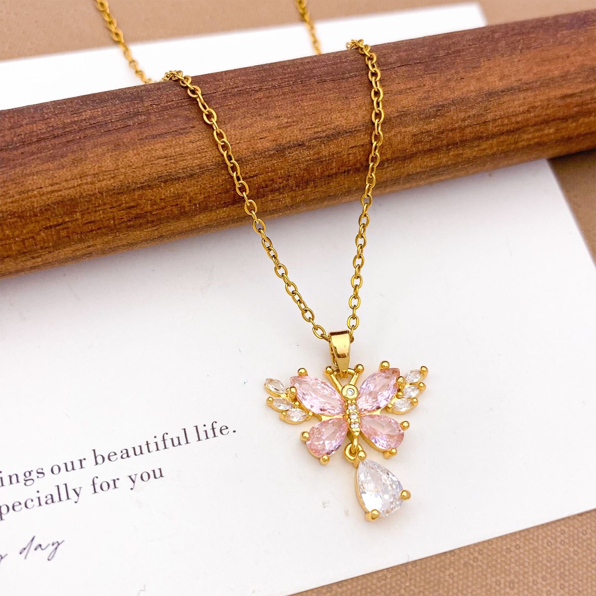 Wholesale Pink heart-shaped bow with diamond studded titanium steel necklace