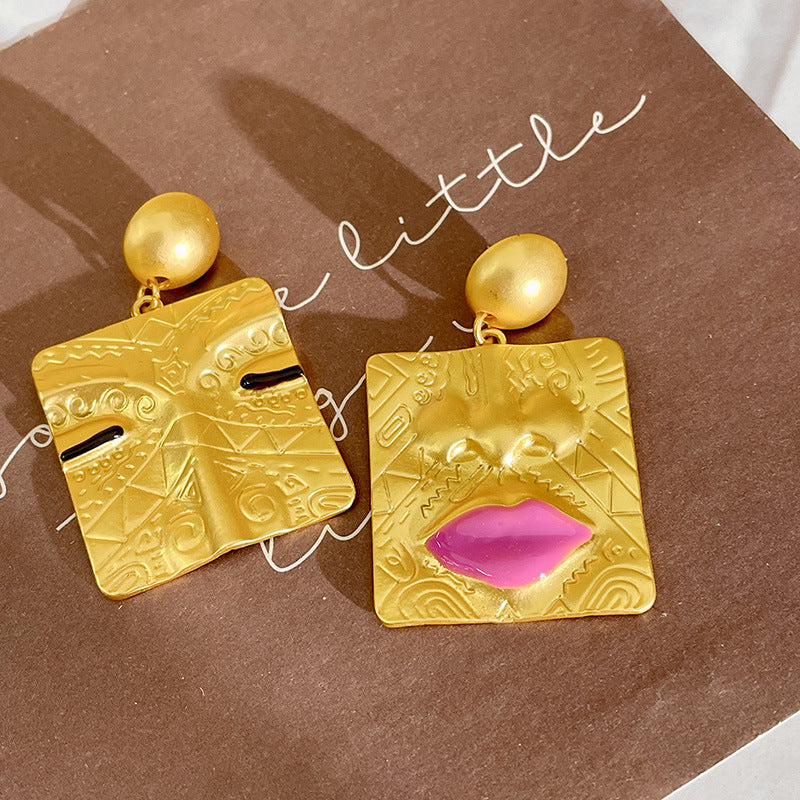 Wholesale Facial Alloy Asymmetric Earrings
