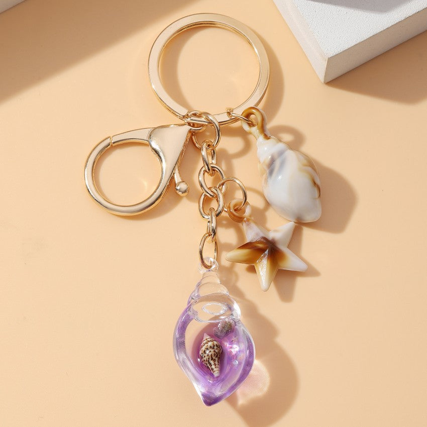 Wholesale Seaside vacation luminous conch Acrylic keychain