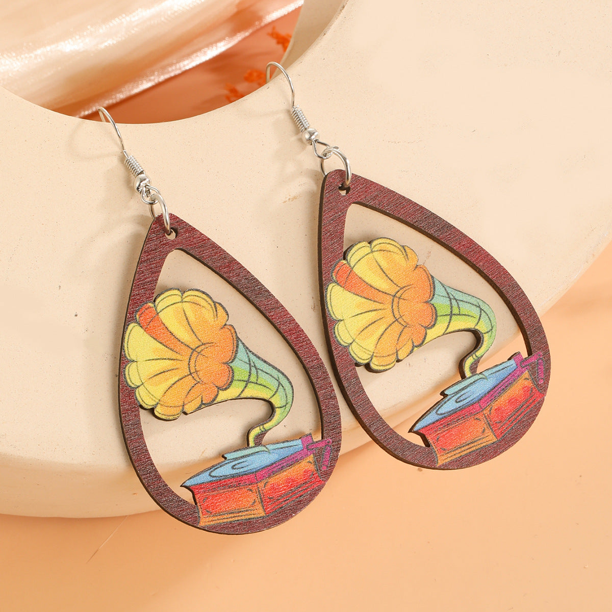 Guitarra de agua de agua al por mayor arpa acordeón estampado de madera aretes de madera