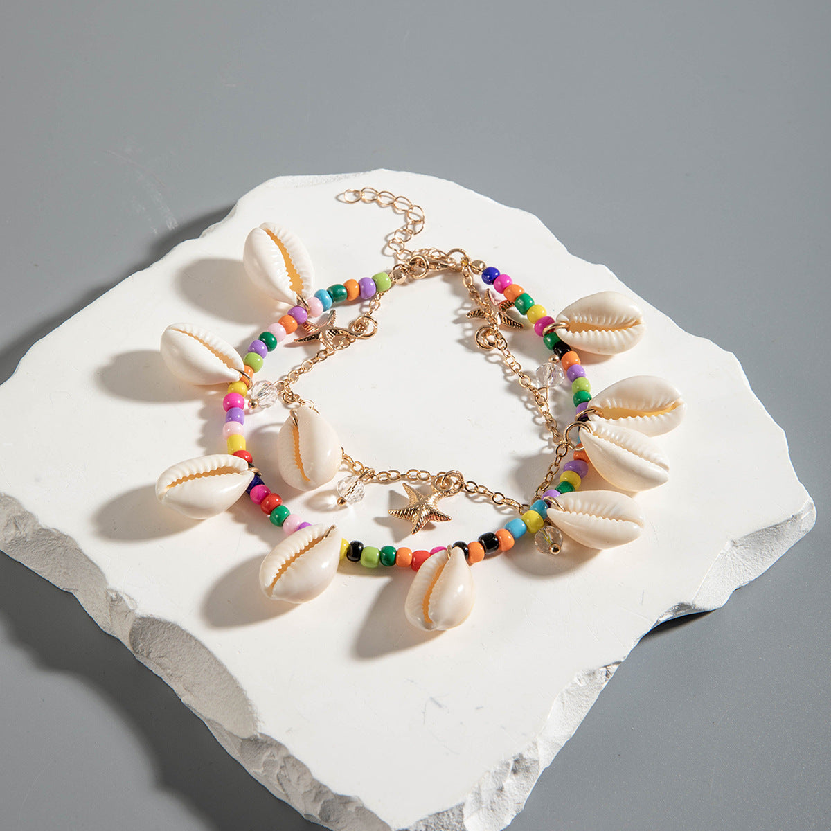 Two pieces of hand-woven anklets from shells