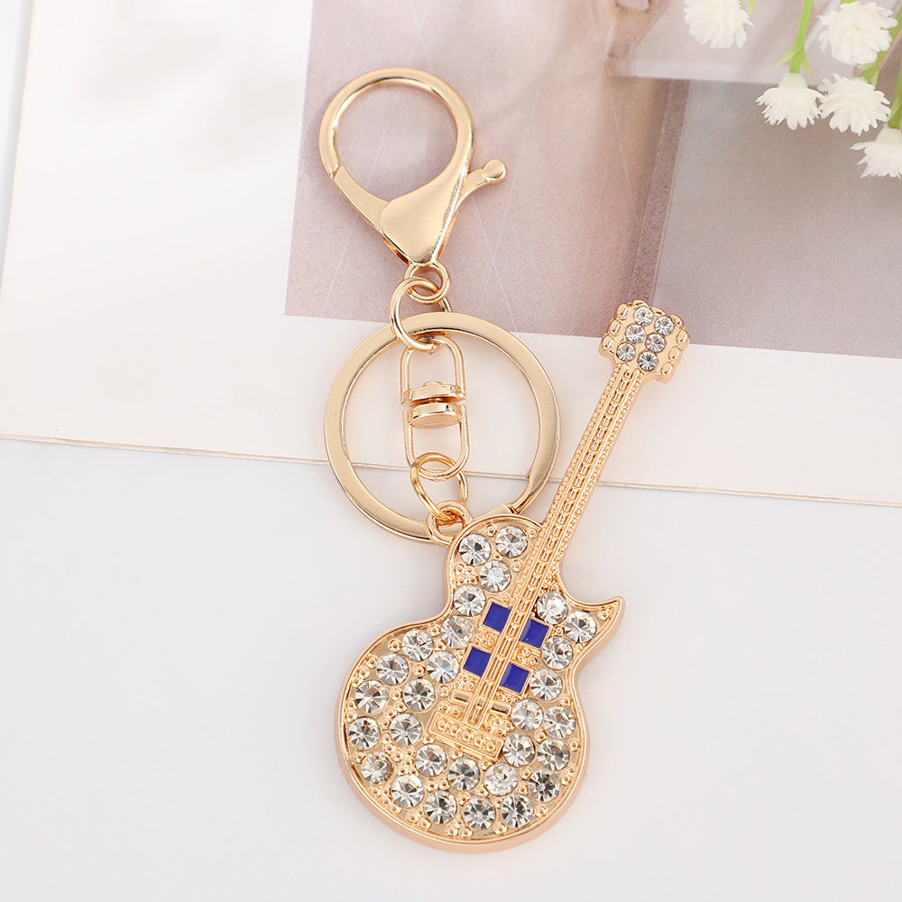 Wholesale Retro guitar with rhinestone metal keychain