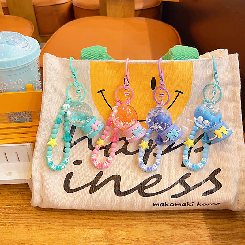 Cadena de llave acrílica de la bola de cristal del océano de sueño al por mayor