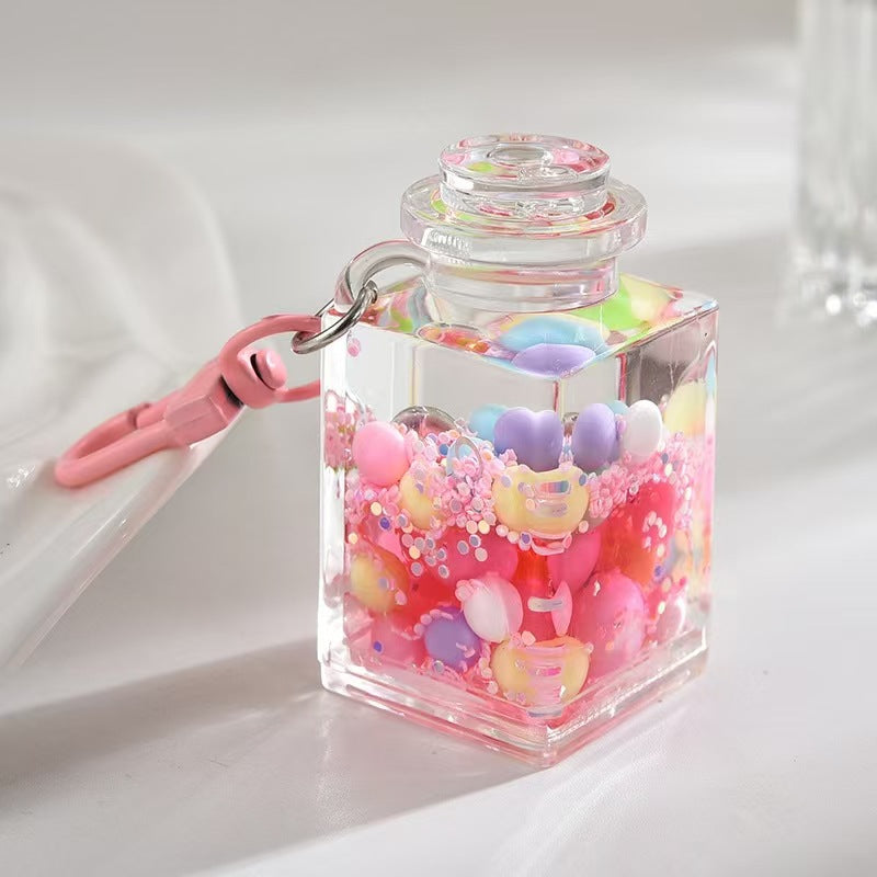Wholesale Liquid sand bottle with colorful beads in oil bottle pendant acrylic keychain